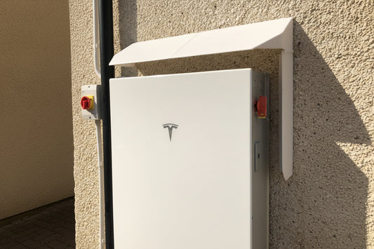 Tesla Powerwall 3 battery unit mounted on a wall